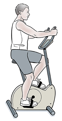Man exercising on stationary bike.