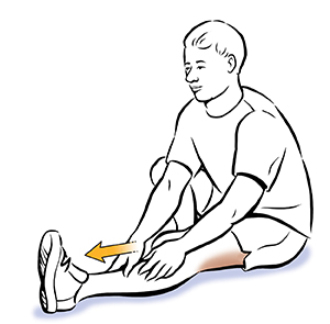 Seated man doing hamstring stretch.