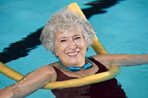 Woman exercising in a pool.