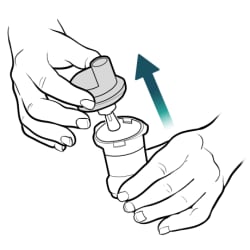 Hand pulling top off medicine cup, with other hand holding bottom of cup.