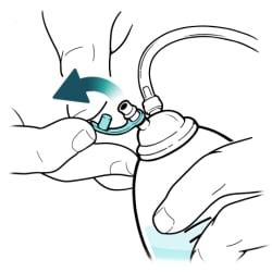 Close-up of bulb opening, with bulb cap being opened.