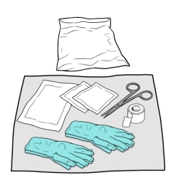 Gauze, scissors, tape, and two pairs of medical gloves laid out on a clean cloth, with a garbage bag nearby.